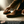 Load image into Gallery viewer, Gentle application and brushing of Suede & Fabric Protector Spray into suede boots to protect nap