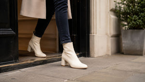 Cream leather ankle boots looking clean, conditioned and ready to wear