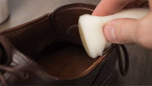 Close-up of the inside of a leather shoe where a small patch test can be carried out