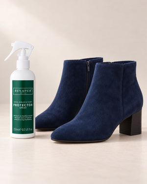 Renapur 250ml Protector Spray beside a pair of navy suede ankle boots.
